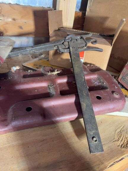 Shelf of miscellaneous car parts and other items