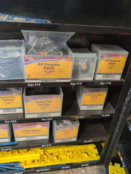 Metal tire repair cabinet with contents