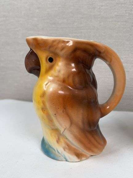 PAIR OF UNUSUAL POTTERY MUGS