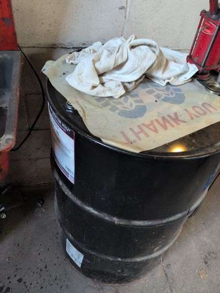 55 gallon drum with pump - appears empty