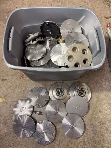 Tote of Miscellaneous hub caps and parts - Buick, Oldsmobile and more - see photos