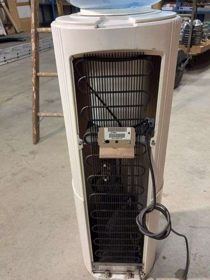 Crystal Springs water cooler with (2) jugs