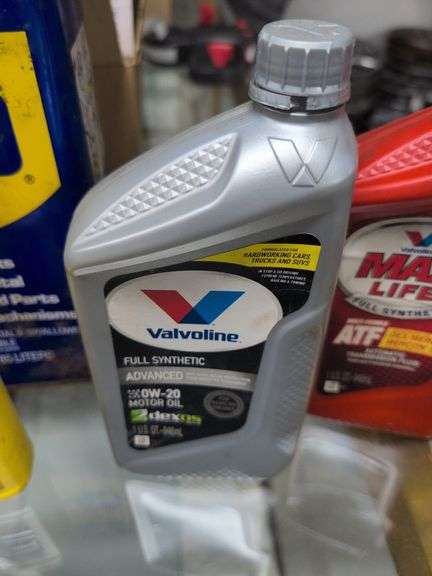 Flat of WD-40, oil, and other mechanic fluids