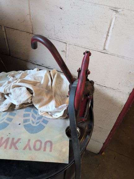 55 gallon drum with pump - appears empty