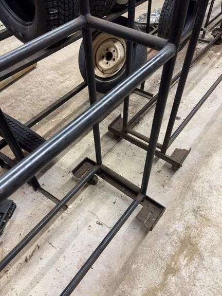 Metal tire rack on wheels - 86" x 14" x 75"