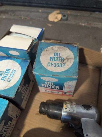 Miscellaneous oil filters, lights, impact wrench, and more