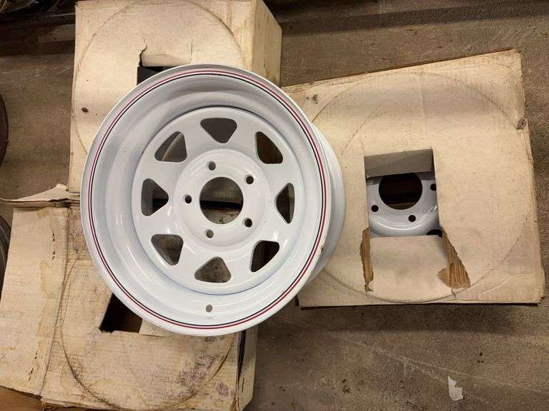 (4) 15” wheel rims in boxes