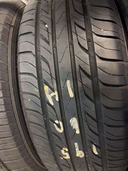 (4) miscellaneous tires like new - (2) 15", (2) 14" - see photos