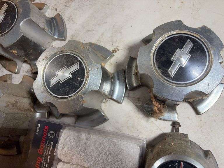 Chevy hubcap parts and other items