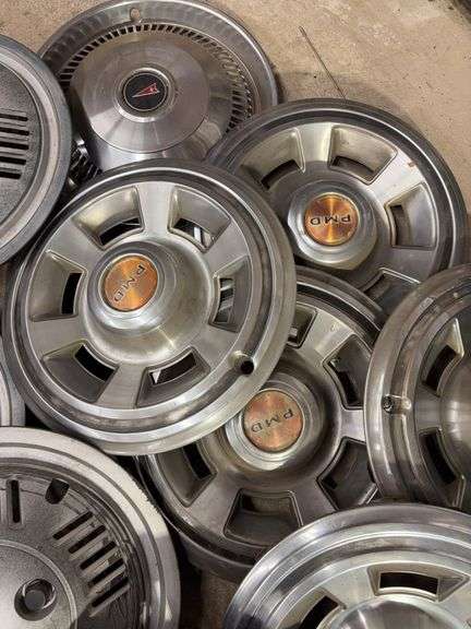 15+ hubcaps - see photos - PMD, Pontiac, and more