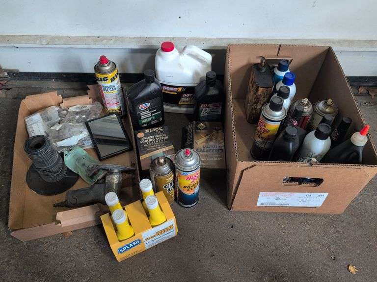 Assortment of mechanic fluids and some tools
