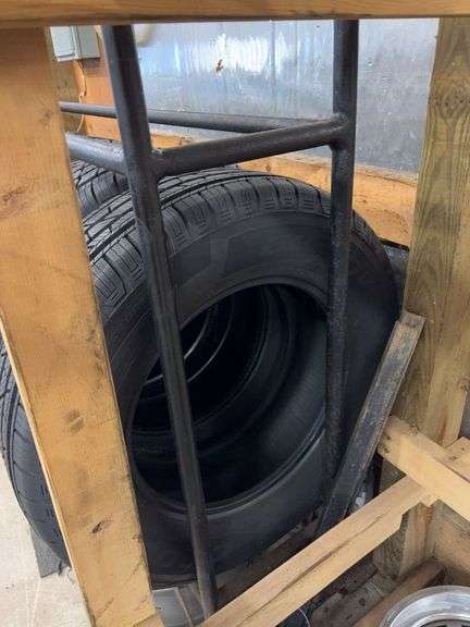 Metal tire rack on wheels - 86" x 14" x 80"