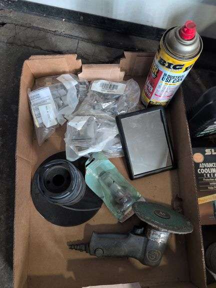 Assortment of mechanic fluids and some tools