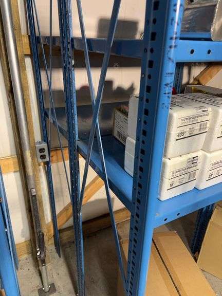 Large blue storage shelf 9’ long, 3’ deep, 7.5’ tall -contents not included