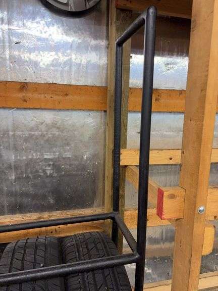 Metal tire rack on wheels - 86" x 14" x 80"