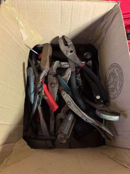 Large assortment of tools - pliers, hammer, wrench, and more