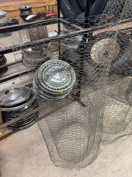Chicken wire, metal fencing, and 6' wooden fencing