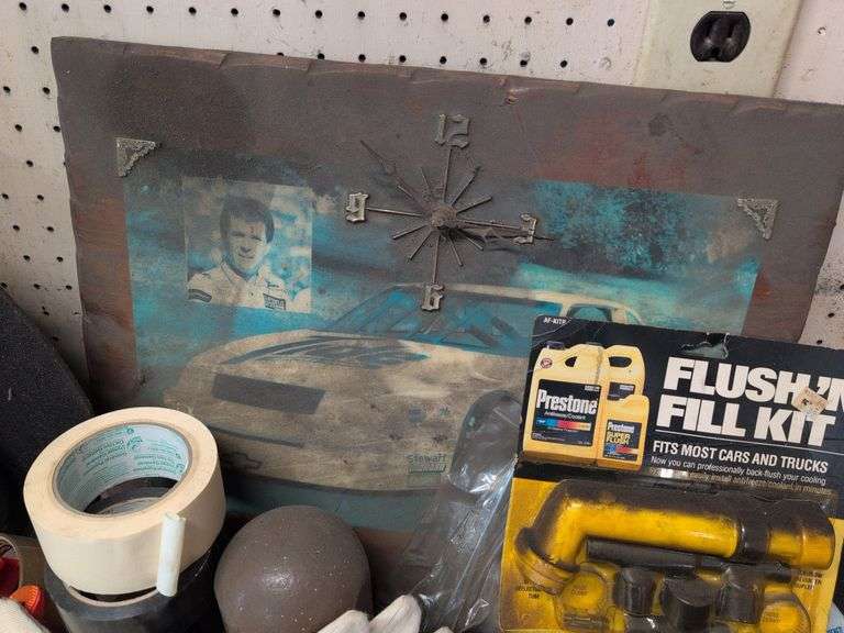 Assortment of items - tape, nuts and bolts, gloves, and more