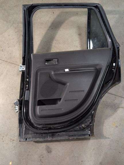 Unmarked black vehicle door - see photos