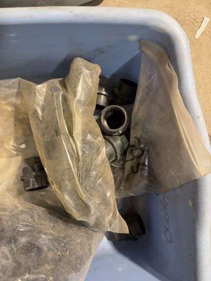 (2) totes of plastic pipe unions
