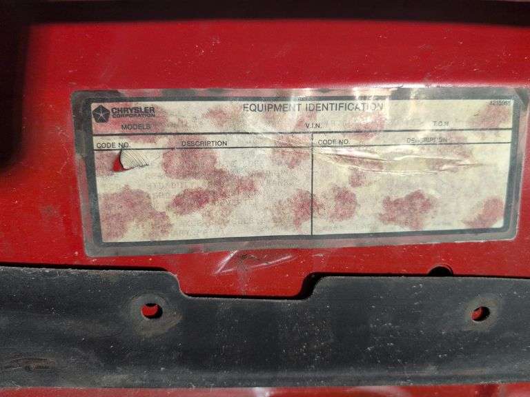 Black Chrysler vehicle hood - see photos