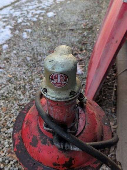 Ford airless spray undercoating with Balcrank industrial pump - appears empty