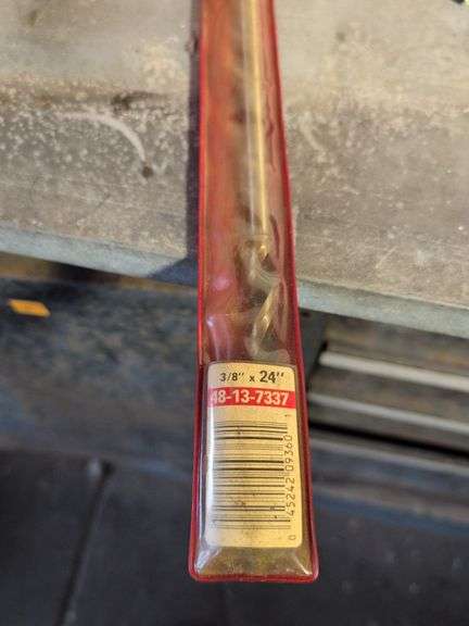 Flat of tools - staples, wrench, and more