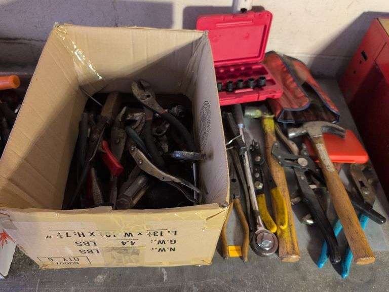 Large assortment of tools - pliers, hammer, wrench, and more
