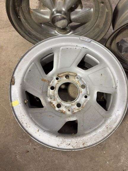 (3) wheel rims - (2) 15" and (1) 14"