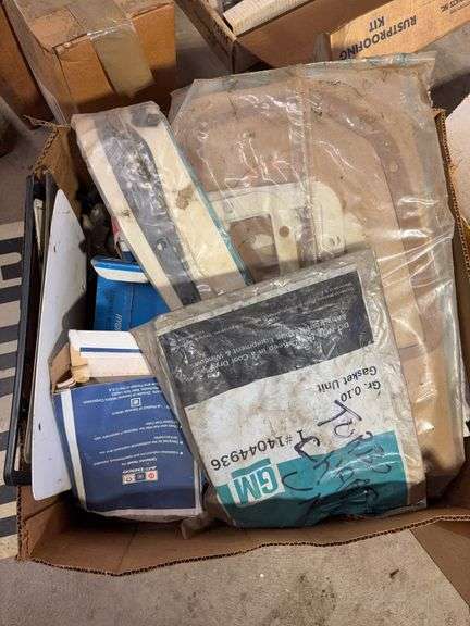 Large assortment of car parts, office supplies, and miscellaneous