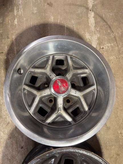 (2) 14" Pontiac wheel rims - see photos
