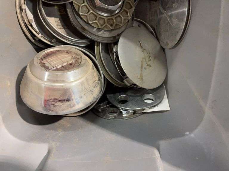 Tote of hubcaps/center caps - mostly Ford