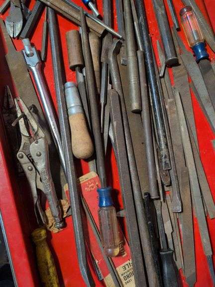 Drawer of files, side cutters, and other tools