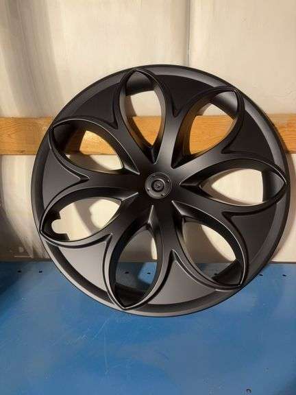 (4) matching 20” hub caps in box