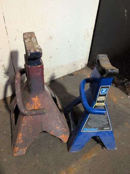 (2) shop brooms and (2) jack stands