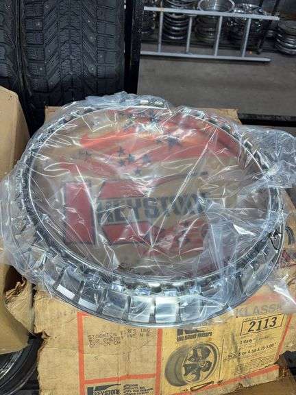 (2) wheel rims in boxes - see photos