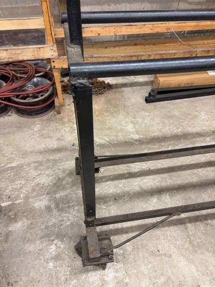 Metal tire rack on wheels - 75" x 14" x 72"