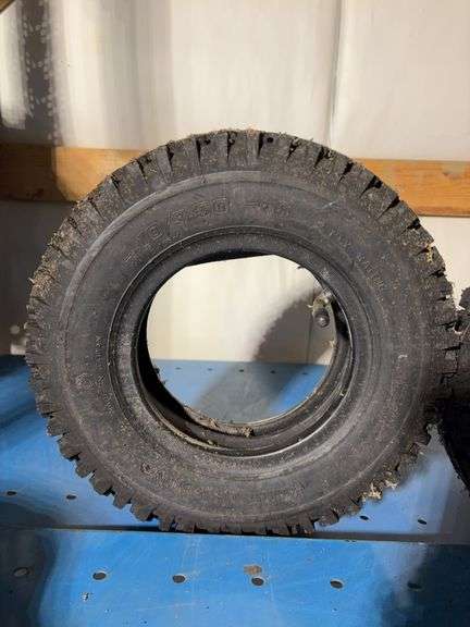 (2) minature tires with rims