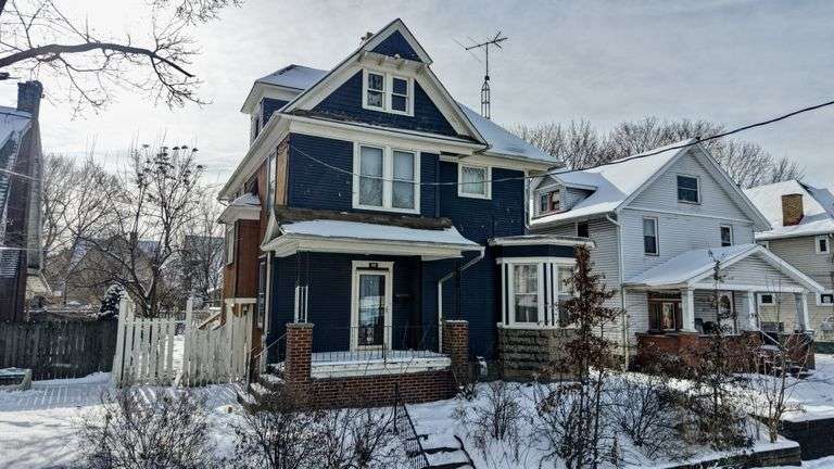 2-Story Home & Detached Garage