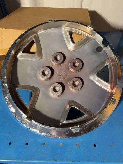 (4) matching hub caps in boxes