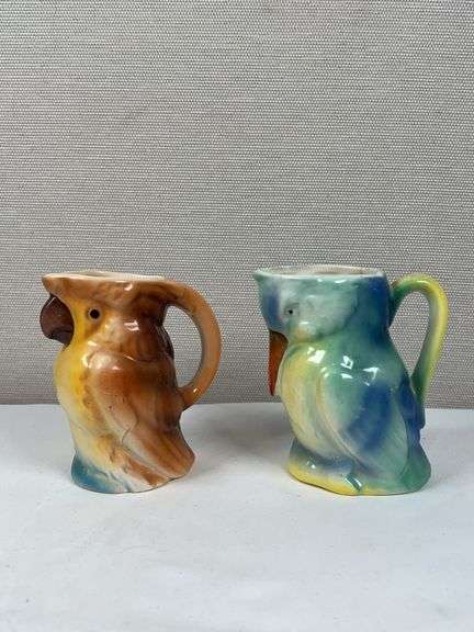 PAIR OF UNUSUAL POTTERY MUGS
