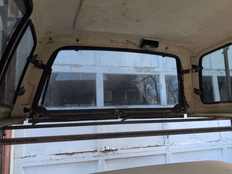 Red Fleer truckbed cap for a Chevy - 7' long, 6' wide