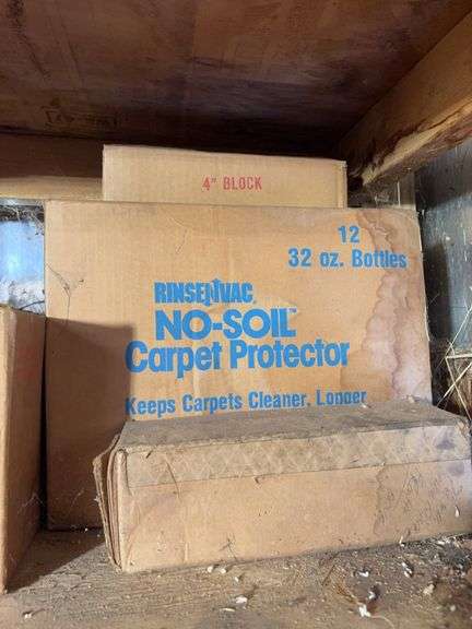 Shelf of miscellaneous car parts and other items