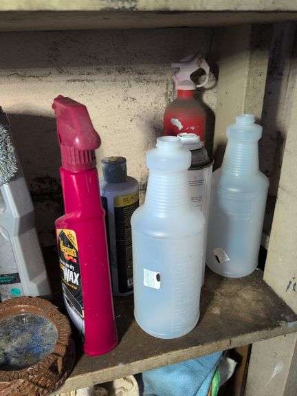 Shelf of glass cleaner, other cleaners, and other vehicle fluids