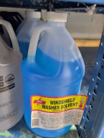 Shelf of coolant, cleaners, windshield washer solvent, and more