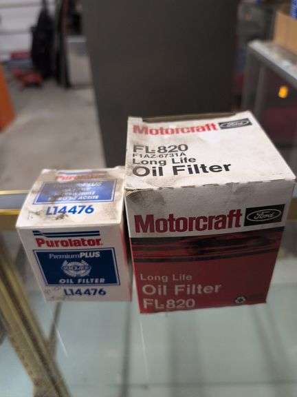 Assortment of oil filters in boxes - see photos