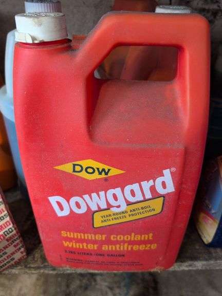 Shelf of shop rags and vehicle fluids