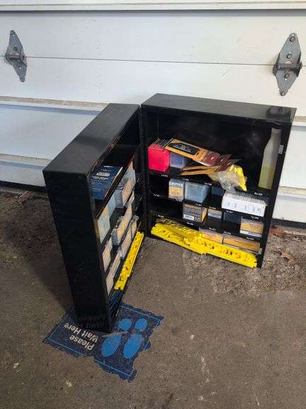 Metal tire repair cabinet with contents