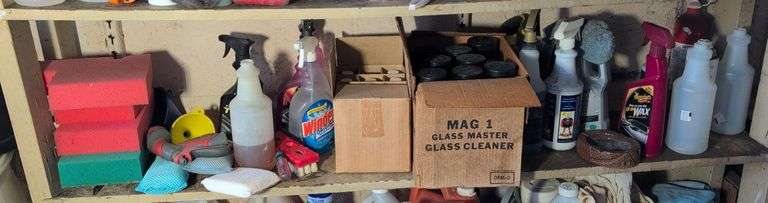 Shelf of glass cleaner, other cleaners, and other vehicle fluids