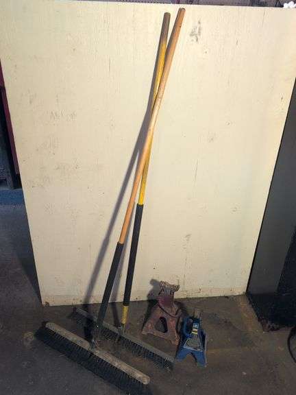 (2) shop brooms and (2) jack stands